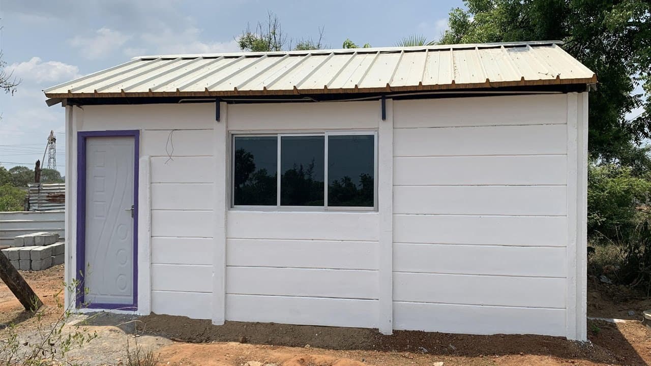 Precast concrete room structure with window and door openings